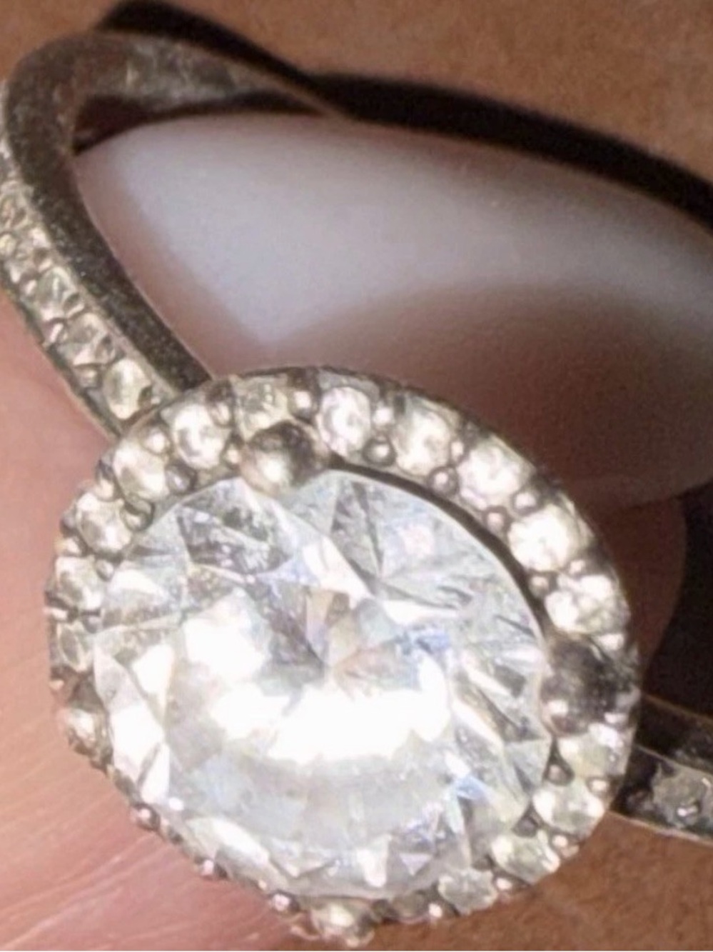 7 Silver Halo Ring with Dazzling White Center Stone